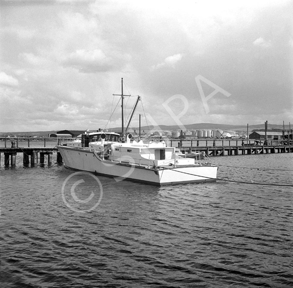 Jack Baxter. Polaris. February 1964. What appears to be a renovated WWII-period motor torpedo boat in Thornbush Quay, Anderson Street, Inverness. *