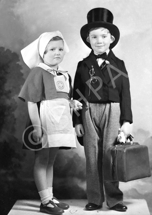 Andrew Chalmers and Elizabeth Bremner dressed as doctor and nurse. (see also refs: 33898, 39880, 42901 and 45474). Andrew was a grandson of the famous photographer Andrew Paterson (1877-1948). 