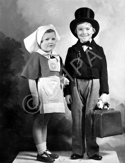 Andrew Chalmers and Elizabeth Bremner dressed as doctor and nurse. (see also refs: 33898, 39880, 42901 and 45474). Andrew was a grandson of the famous photographer Andrew Paterson (1877-1948). 