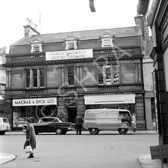 Friends' Provident Century Insurance, Macrae & Dick radio and tv shop and Mitchell & Craig (purveyors of fine foods and rare wines) in Academy Street, Inverness. Entrance to the Andrew Paterson Studio was to the left of Macre & Dick. *