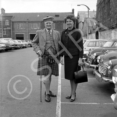 Caption states 'Betty with grandpa Matheson.' In the car park of what is now Farraline Park Bus Stat.....