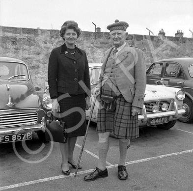 Caption states 'Betty with grandpa Matheson.' In the car park of what is now Farraline Park Bus Stat.....