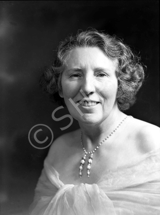 Mrs McGrigor-Phillips a.k.a Dorothy Una Ratcliffe (1887-1967). Yorkshire Poet. Born in Brighton of a Yorkshire father, Dorothy moved to Leeds upon her first marriage and began a writing career that lasted from the 1920s to the 1960s, publishing 40 books of poetry, memoirs, character sketches and plays and contributing many articles to the Dalesman and The Yorkshire Post. Her maiden name was Clough. Her first marriage to Charles Ratcliffe (nephew of Edward Allen Brotherton, Lord Brotherton of Wakefield, self-made chemical magnate) ended c.1930 although she retained Ratcliffe as a pen name her whole life. Her second husband was Noel McGrigor-Phillips who died c1942 and with whom she renovated Temple Sowerby Manor (now known as the National Trust property, Acorn Bank in Cumbria). She later married Alfred Charles Vowles in 1947, but refused to change her name, so Alfred changed his to Phillips. She was the youngest ever Lady Mayoress of Leeds (1913-14), officially partnering her widowed father in law. She was a philanthropist and patron of the arts and literature (being responsible for the origination and eventual endowment of the Brotherton collection of early printed books now in Leeds University library). She travelled extensively to Africa, Europe, Iceland and particularly to Greece, but the Second World War and Noel's deteriorating health curtailed foreign travel and directed her to the British Isles. Both with Noel and later with Alfred, a professional photographer from the West Country, she explored Scotland - often in a caravan - and after leaving Temple Sowerby eventually settled in Edinburgh (Anne Street) in the 1950s. She remained there with Alfred for the rest of their married life, and eventually moved to a flat overlooking the sea in North Berwick after Alfred died in the early 1960s. She died in 1967, age 80 with her first novel half-completed. A more complete biography and additional photographs available here:  http://www.artisan-harmony.com/durplusbutton.htm 