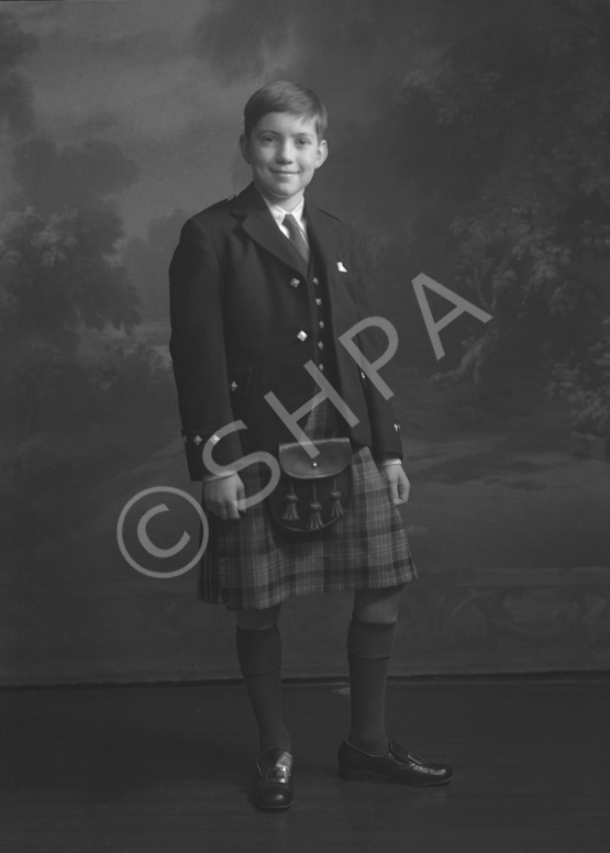Andrew Chalmers dressed in school uniform for Sundays at the Loretto Boarding School, Edinburgh. (see also refs: 33898, 39550 and 45474). He was a grandson of the famous photographer Andrew Paterson (1877-1948).