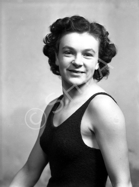 Miss Margaret Munro was the holder of several national swimming titles. She later emigrated to Austr.....