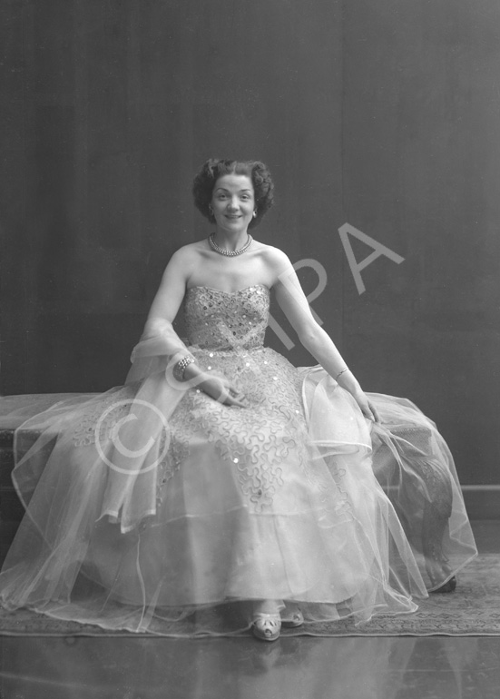 Miss Cairns, Station Hotel, Inverness, in ball gown, seated. Other images also under code 42904......
