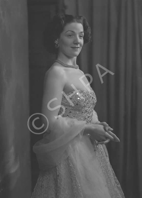 Miss Cairns, Station Hotel, Inverness, in ball gown, standing. Other images also under code 42904......