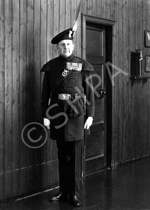 Brigadier Kenneth James Garner Garner-Smith OBE, in the dress of the Royal Company of Archers. He jo.....