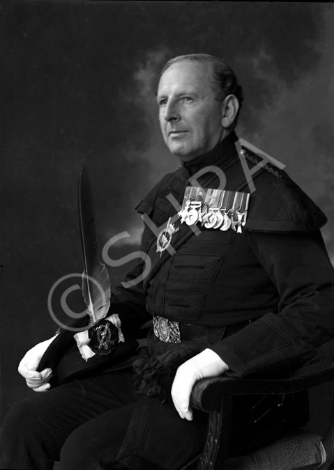 Brigadier Kenneth James Garner Garner-Smith OBE, in the dress of the Royal Company of Archers. He joined the Seaforth Highlanders in 1927 and retired as a Brigadier in 1957. He lived at Aird House, Inverness and was a Burgh Councillor for 11 years. Married Mary Jean Macdonald (1914-2013) on 4th July 1933 at St. Marks Church, London. He died in 1994. Parents of Mary-Jean, Caroline and Jamie.