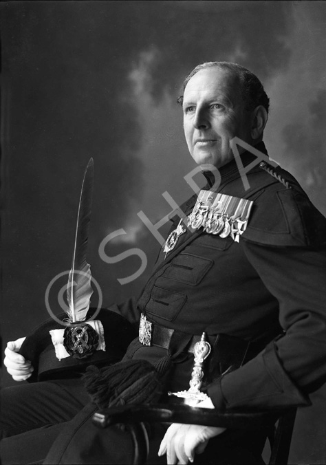 Brigadier Kenneth James Garner Garner-Smith OBE, in the dress of the Royal Company of Archers. He joined the Seaforth Highlanders in 1927 and retired as a Brigadier in 1957. He lived at Aird House, Inverness and was a Burgh Councillor for 11 years. Married Mary Jean Macdonald (1914-2013) on 4th July 1933 at St. Marks Church, London. He died in 1994. Parents of Mary-Jean, Caroline and Jamie.