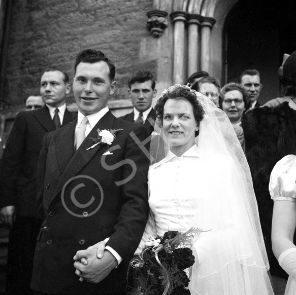 Mr & Mrs Angus MacLeod outside the St. Columba High Church, Bank Street, Inverness, now the CityLife Church. 