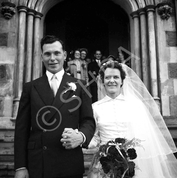 Mr & Mrs Angus MacLeod outside the St. Columba High Church, Bank Street, Inverness, now the CityLife Church. 