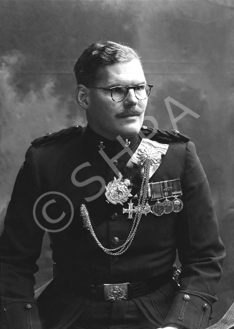 Mungo Graham. Insignia indicates The Cameronians (Scottish Rifles) and the badges include (left to right), Military Cross, 1939-1945 Star, Italy Star, Defence Medal 1939-1945, War Medal 1939-1945 and the General Service Medal with the bar possibly Palestine 1945-1948. The War Medal ribbon has a bronze oak leaf emblem signifying the wearer has been mentioned in despatches.