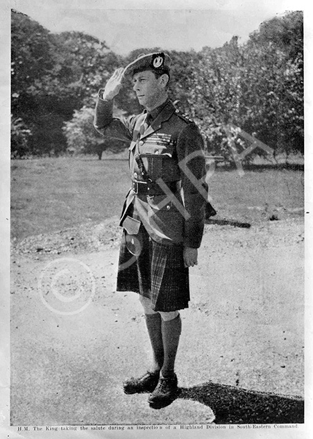 Copy for Cameron Barracks of King George VI taking salute while inspecting a Highland Division in SE Command in 1942. 