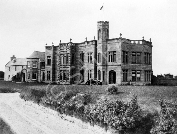 Mrs Gordon, Pitcalzean, Nigg. Copy of Dunskaith House, Nigg. The original house is at the far left, but it was significantly enlarged between 1901 and 1906 after its purchase by the Romanes family. The Cromarty Firth was used as a naval base during World War One, and Dunskaith House briefly became a naval hospital, but because of poor water supply to the house it was turned into a naval supplies store. It stood near to the Nigg pier and was almost wholly destroyed by fire in 1960 with only the servants' quarters surviving. *