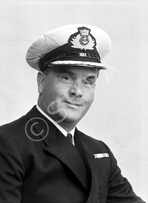 Captain K. Mackenzie of the 'Esso'.
.....