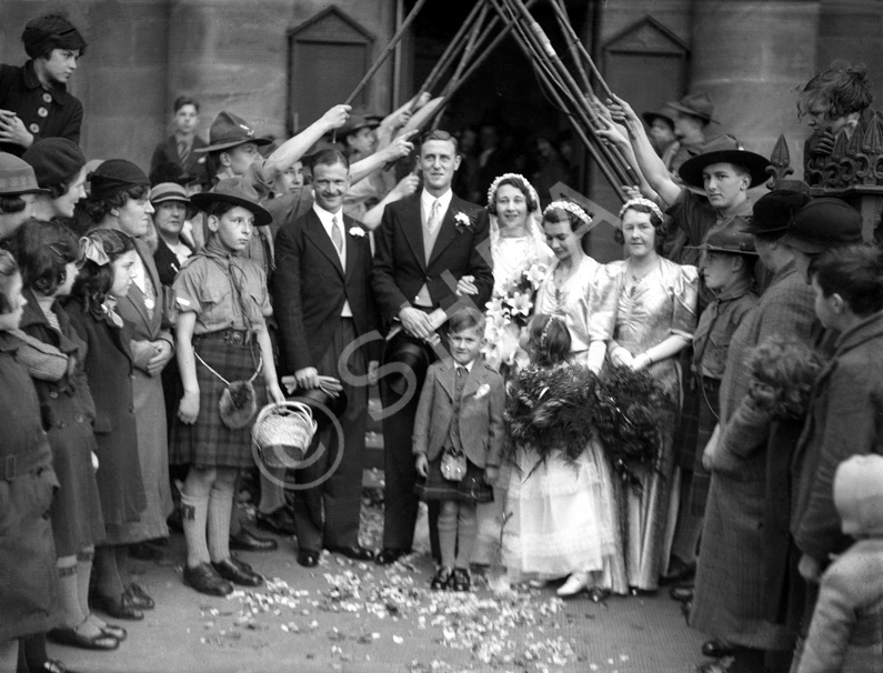 Bridal procession with Scouts and staffs. Possibly taken outside the old West Church in the late 193.....