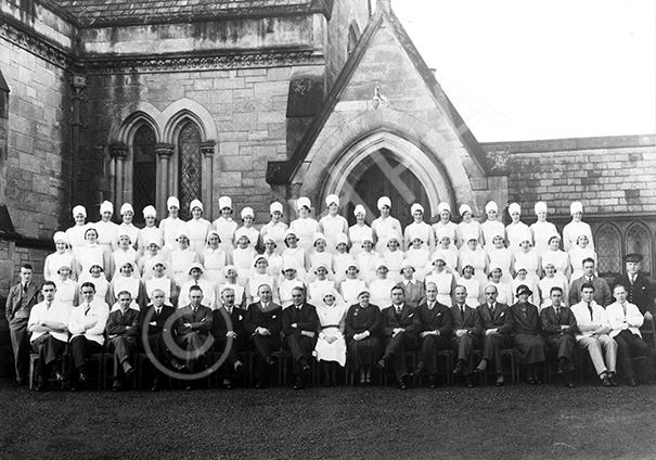 Copy for Gilbert Ross (seated fifth from the right) of nursing staff group outside the Infirmary in .....