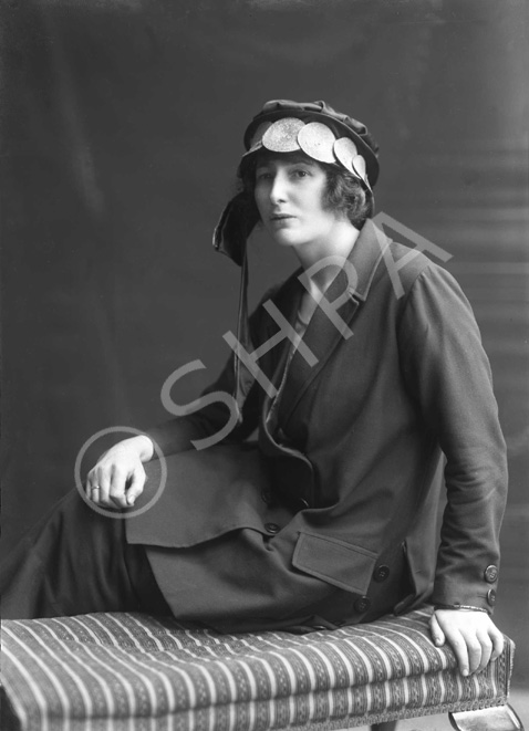 Young woman seated wearing hat c.1922. #