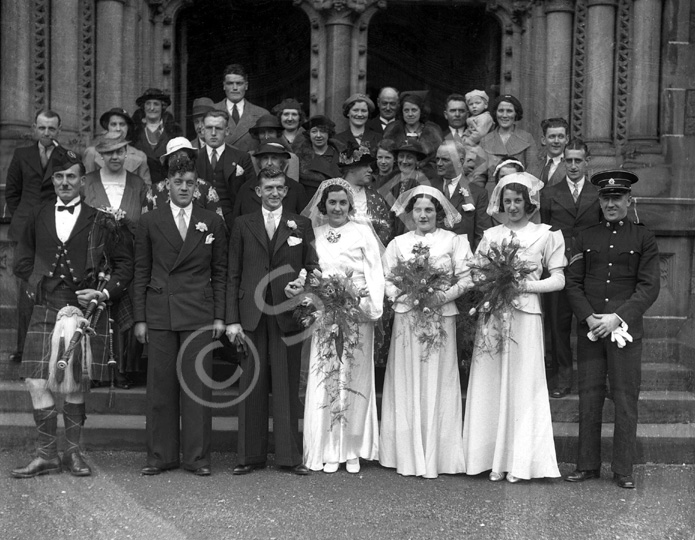 Wedding group portrait outside Inverness Cathedral.  #.....