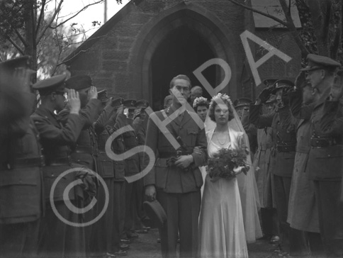 Dawn Ritchie and Norwegian Eric Prydz bridal, leaving the St. Andrew's Episcopal Church on Manse Street, Tain. They went to live in Norway. The honour guard is made up from Eric's Norwegian Army colleagues, who were stationed in Tain at the time.