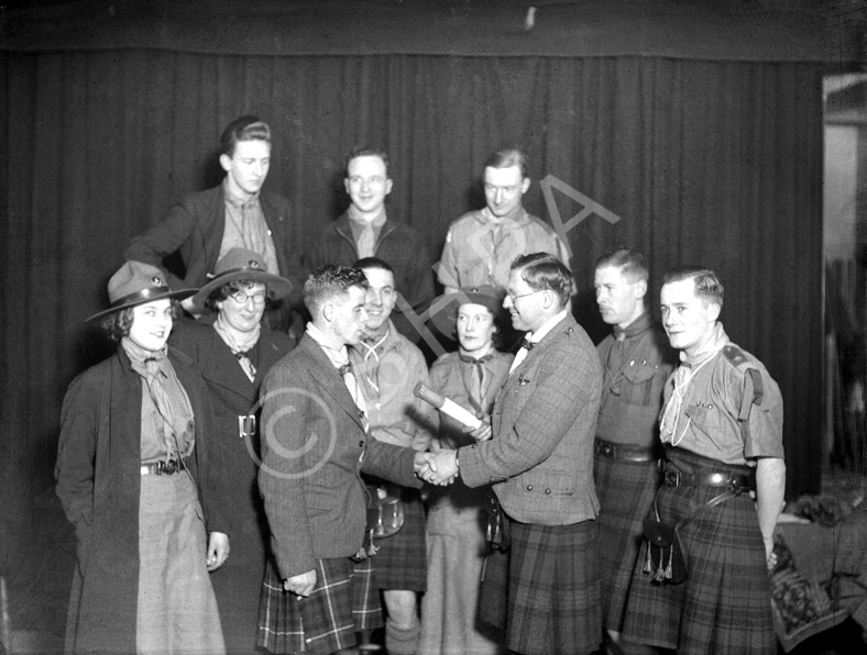 Scout ceremony. Dated c1930s and possibly taken in the since demolished Little Theatre at the top of.....