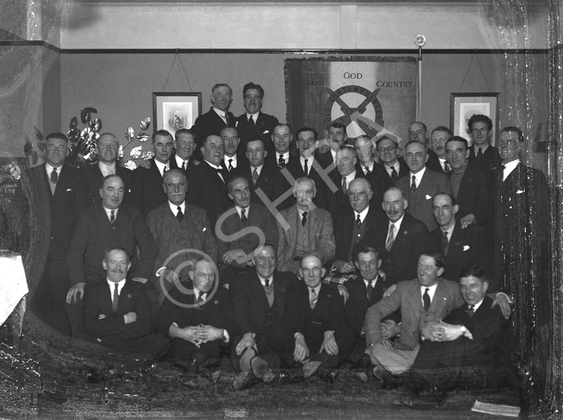 Meeting of the Old Contemptibles Association (Aug 5-Nov 22 1914). The Old Contemptibles Association was founded by Capt J.P Danny, RA on 25th June 1925. The Association had 178 branches in the UK and 14 overseas branches. All members were known as 'chums.' The banner in the background now hangs in the Inverness Town House. Damaged plate. #
