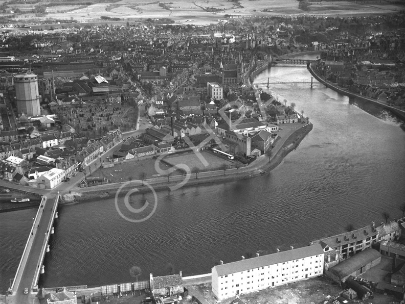 Aerial view over Inverness, looking upriver. The fork between Academy and Church Street is in the ce.....