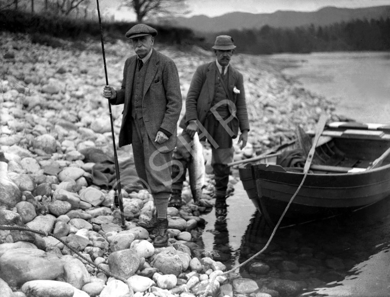 Salmon fishermen on Highlands river. #