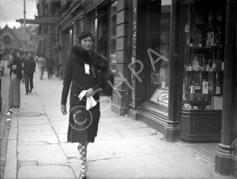 The Duchess of Sutherland (1867-1955) walking down Academy Street, Inverness in 1936. Millicent Sutherland-Leveson-Gower was a British society hostess, social reformer, author, editor, journalist and playwright, often using the pen name Erskine Gower. Her first husband was Cromartie Sutherland-Leveson-Gower, 4th Duke of Sutherland. By her two later marriages, she was known as Lady Millicent Fitzgerald and Lady Millicent Hawes, the latter of which was the name she used at the time of her death. She lived mostly in France through the 1920s and 1930s, and also travelled. She was living near Angers in 1940, and was captured after the German occupation of France. She escaped via Spain and Portugal to the United States, and returned to Paris in 1945. She died in Orriule in south-west France and was cremated in Paris, her ashes being interred at the Sutherland private cemetery at Dunrobin Castle. She was survived by her eldest son, George Granville Sutherland-Leveson-Gower, 5th Duke of Sutherland. 