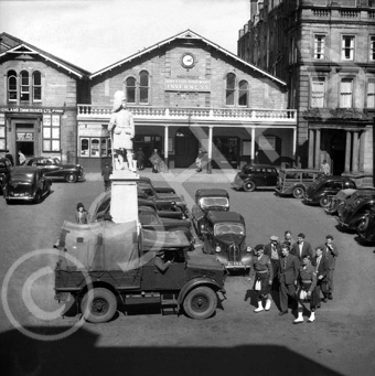 Station Square, Academy Street, Inverness. Training NCOs meeting new recruits at Inverness Station in 1952. After training at Cameron Barracks the recruits would be posted to the 1st Battalion The Queen's Own Cameron Highlanders which was then serving in Austria. *