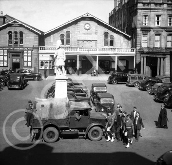 Station Square, Academy Street, Inverness. Training NCOs meeting new recruits at Inverness Station in 1952. After training at Cameron Barracks the recruits would be posted to the 1st Battalion The Queen's Own Cameron Highlanders which was then serving in Austria. *