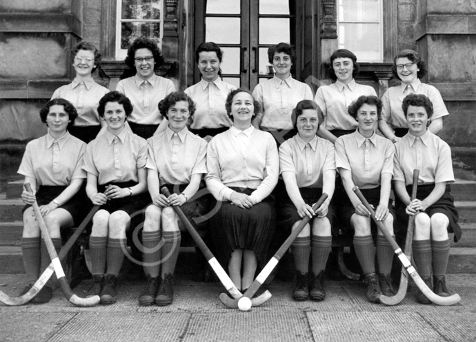 Hockey 1st XI 1956-1957. Rear: Winnifred Elliot, Elizabeth Mann, Margaret Rankine, Maureen Bruce, Margaret Ferguson, Anne Richards. Front: Shona Gorman, Shonaid Robertson, Ishbel Cameron (C), Miss Maude Yule, Pat Cumming (VC), Marion Renfrew, Patricia Urquhart. (Courtesy Inverness Royal Academy Archive IRAA_002).