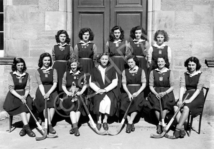 Hockey 1st XI 1947-1948. Team members were: Aileen Barr (C), Sheila S. Cameron (VC), Belle Munro (Se.....