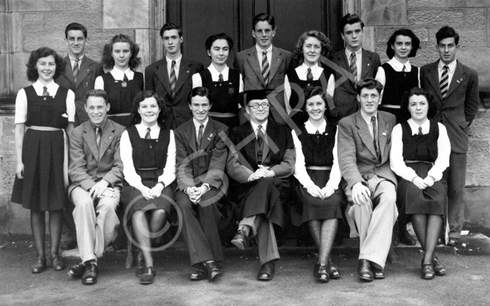 Inverness Royal Academy Prefects 1946-1947. Rear: Betty Martin, Hugh Williamson, Effie MacIntyre, John Martin, Christabel Donald, Alistair Fraser, Alison MacNair, Gordon MacKenzie, Muriel Thompson, Alan Douglas. Front: Peter Cameron, Catherine Tulloch, Donald Oliver, Rector D.J MacDonald, Netta Robertson, Murdo Christie, Rhoda Cameron. (Courtesy Inverness Royal Academy Archive IRAA_046).