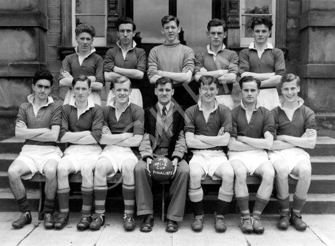 Association Football 1st XI Cup Finalists 1951-1952. Rear: John A. MacKenzie, Archibald MacAulay, James T. Smith, Angus A. MacLean, Will Cameron. Front: Alfred MacKintosh, David Forrest, Lachlan Russell (C), Mr Frank Cunningham, Leslie Hodge (VC), Neil W. Smith, Ian Rodger. (Courtesy Inverness Royal Academy Archive IRAA_077).