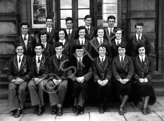 Inverness Royal Academy Prefects 1953-1954. Rear: A. MacLeod, D. Dewar, William Ford, I. Philip. Middle: A. Griffiths, K. Kane, M. Eunson,  V. Beveridge, S. Martin, M. MacRae, A. Grant. Front: D. Robin, S. Sanderson, A. MacDiarmid, Rector D.J MacDonald, A. Sinclair, S. Love,  J. Fraser. (Courtesy Inverness Royal Academy Archive IRAA_085).