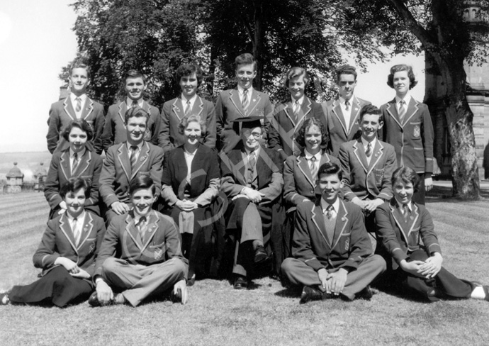 Inverness Royal Academy Prefects 1954-1955. Rear: Ian Robin, Robert Cameron, Iris More, Andrew Matheson, Mary Porteous, John Urquhart, Beatrice MacPherson. Middle: Mary Brown, Ian Philip,  Miss E. Forbes, Rector D.J MacDonald, Maureen Eunson, Alastair MacLeod. Front: Irene Davidson, Ian MacPhee, Robert Dewar, Chrisalda MacKay.  (Courtesy Inverness Royal Academy Archive IRAA_087).