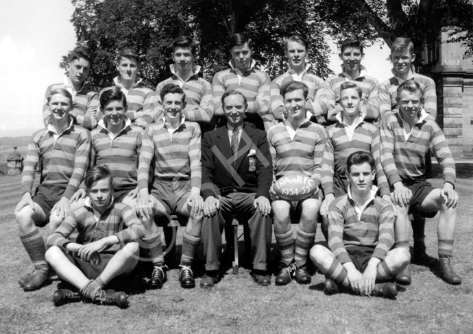 Rugby 1st XI 1954-1955. Rear: Donald MacLeod, John Watson, Jack Bosworth, Ian Boag, David Moffat, Robert Dewar,  Robert Ewen. Middle: Alastair MacKenzie, Roderick MacKenzie, Alastair MacLeod, Mr Murray, Ian Philip, Ian Robin, John Robertson. Front: Ewen Lawson, Donald Campbell. (Courtesy Inverness Royal Academy Archive IRAA_096).