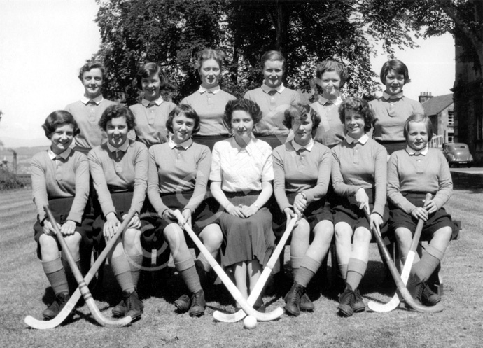 Hockey 1954-1955. Rear: Helen Simpson, Morven Jenkins, Ena Munro, Elizabeth McIntyre, Winifred Elliot, Catherine McInnis. Front: Patricia Cumming, Elizabeth Mann, Margaret Ferguson, Sheila Momsen, Pat Urquhart, Ann Dand. (Courtesy Inverness Royal Academy Archive IRAA_097).