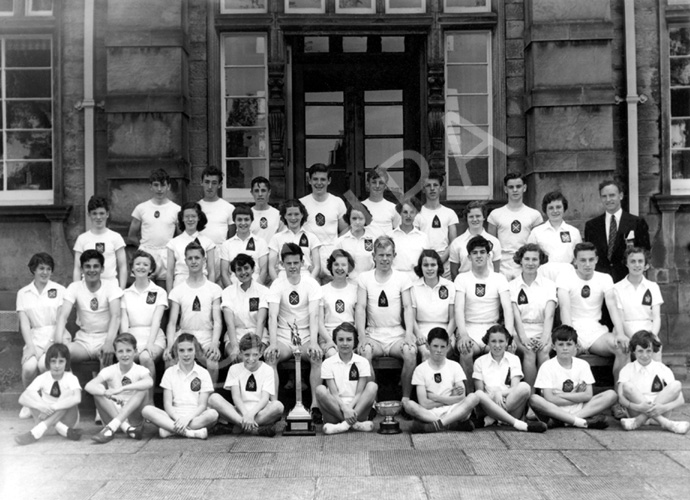 Inverness Royal Academy Athletics 1955-1956. Rear: William Paterson, Peter Willis, Roderick MacFarquhar, Roderick MacKenzie, Ian Fraser, Peter  Strachan, Donald Campbell. 2nd row: David Philip, Hazel MacPherson, Janet Campbell, Kathleen Russell, Lorna Campbell, Marion Renfrew, Robin MacDonald, Pat Cummings, Mr Murray. 3rd row: Catherine MacInnes, Kenneth Gardener, Winnifred Elliot, Ian Robin, Maureen Bruce, Ian Nicol, Dorothy Lamont, John Robertson, Sheena Campbell, James Wylie, Ishbel Cameron, Gerald Taylor, Helen Simpson. Front: Sandra Forbes, Fraser Urquhart, Verity MacIntosh, Alan Cunningham, Joan Menzies, David  MacFarquhar, Jenny Martin, James Grant, Margaret MacLennan. (Courtesy Inverness Royal  Academy Archive IRAA_106).