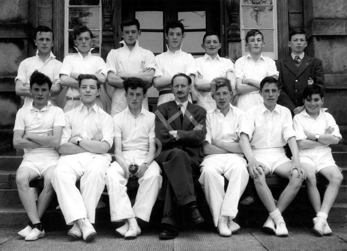 Inverness Royal Academy Cricket Colts 1955-1956. Rear: David Richards, John Summers, Alex MacDonald, Sandy Stewart, Alan Spence, Derick  MacRae, Stewart Fraser. Front: Alex MacDonald, Colin MacLennan, Ian MacDiarmid, Mr Thom, James MacQueen, Roderick MacFarquhar, Raymond MacDonald. (Courtesy Inverness Royal Academy Archive IRAA_107).