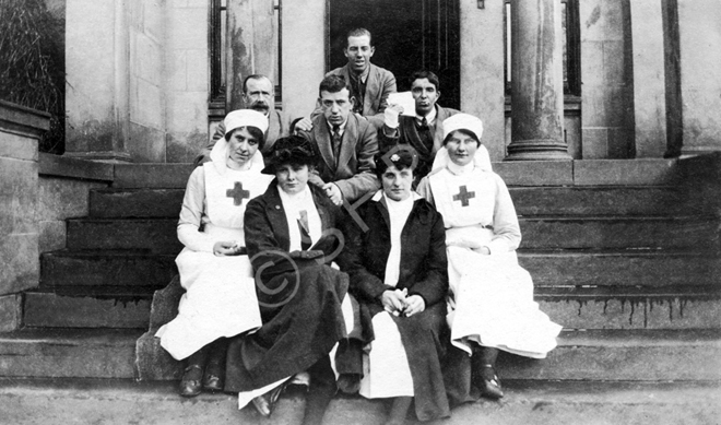 Recuperating soldiers and nurses at the Hedgefield House Red Cross Hospital during the First World War. May Fraser is seated at front right. Submitted by her daughter Heather Watts. (Fraser-Watts Collection)