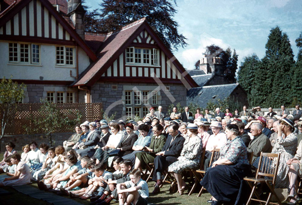 Opening of the new Carrol House Orphanage, Island Bank Road, Inverness. The Carrol House Orphanage was officially opened at 3.00pm on Wednesday 26th August 1959 by Lady Maud Baillie CBE. Eighteen children, cared for by the Highland Orphanage Trust, moved from the old building in Culduthel Road a few weeks previously and settled in to the more compact and up-to-date premises. Robert Gilbert, chairman of the Board of Governors presided at the well-attended ceremony, which was also addressed by Provost Robert Wotherspoon. The matron was Mrs M. Maclean and the two house-mothers were Miss I. Ross and Miss N. Donaldson. A bouquet was presented to Lady Baillie by Heather la Freniere, one of the children in the home. (Courtesy James S Nairn Colour Collection). ~