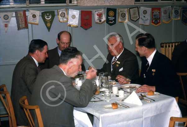 Rotary Club dinner. Along back row Hugh Jack, Frank Critchley and Provost William Smith. (Courtesy James S Nairn Colour Collection) ~