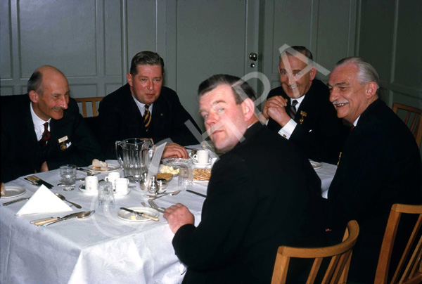 Rotary Club dinner. Second left Donald Mackillop, centre Sandy Cameron, second right Ian Raffin. (Courtesy James S Nairn Colour Collection) ~
