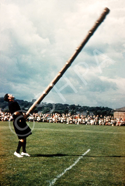 Tossing the caber. (Courtesy James S Nairn Colour Collection). ~ *
