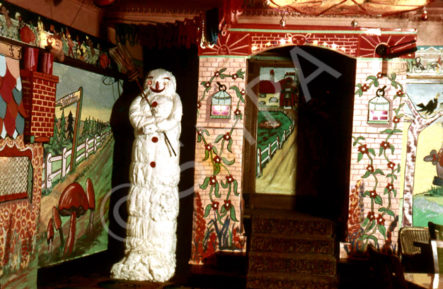 Playhouse Cinema foyer and restaurant, Christmas 1957. Every Christmas season, James Nairn, photographer and manager of the Playhouse, would decorate the foyer and cafe with hand painted cartoon and Disney themes to the delight of visiting children. The Playhouse Cinema was destroyed by fire in 1972, and sadly James Nairn lost the bulk of his photographic and memorabilia archives. (Courtesy James S Nairn Colour Collection). ~ *