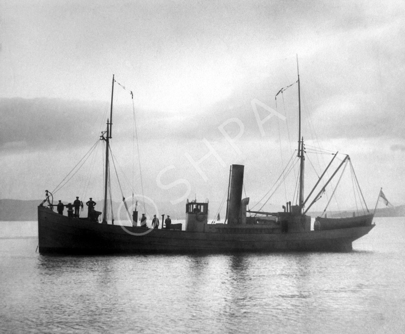 The fishing drifter Clans of Macduff was used as an armed naval auxiliary during the First World War. She was built in 1915 and requisitioned by the Admiralty for wartime service in June. Returned to the owners in 1919 she was again requisitioned for service in August 1939 until April 1945 as a Harbour Service Vessel. In this photo the crew are wearing uniform and she is flying the White Ensign. Submitted by Robert Paterson.*
