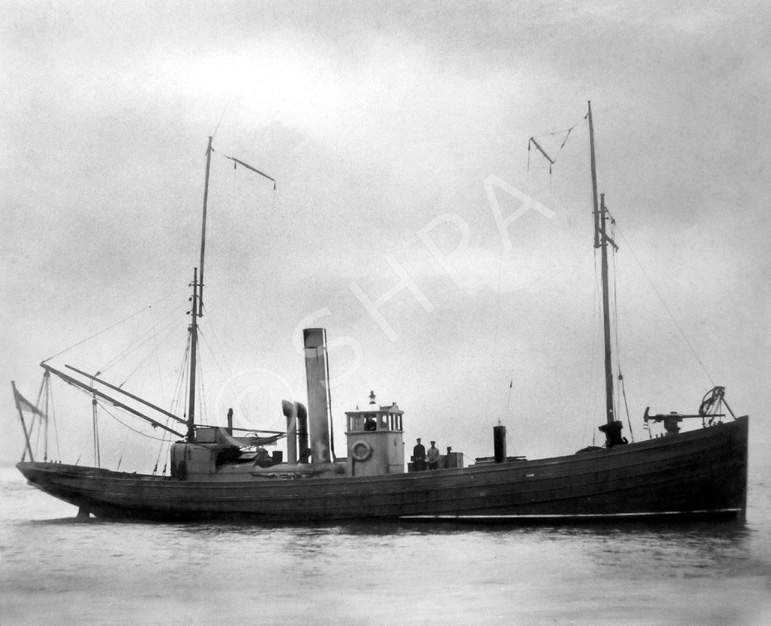 The fishing drifter Lavatera was used as an armed naval auxiliary during the First World War. She was built in 1913 by W & G Stephen of Banff for John Wood Snr. and requisitioned by the Admiralty for wartime service in the Royal Navy in March 1915, and returned to the owners in 1920. During the Second World War it was again requisitioned in April 1940 until July 1946 and first used as a Barrage Balloon Vessel (BBV) and later as a Harbour Service Vessel. She was scrapped in 1948. In the photo the crew are in civilian clothing, and the bow-mounted cannon (a three pounder gun) is clearly visible. She is flying the White Ensign. Submitted by Robert Paterson.*